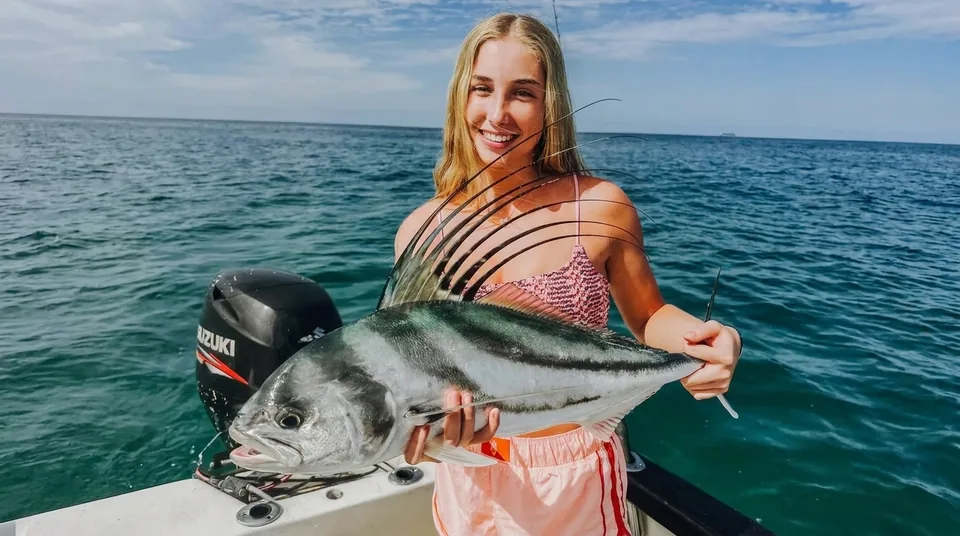 Angler with a trophy roosterfish caught off Baja California Sur