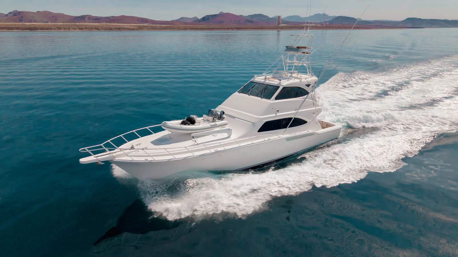 Tag Cabo convertible sportfisher running the Baja coastline